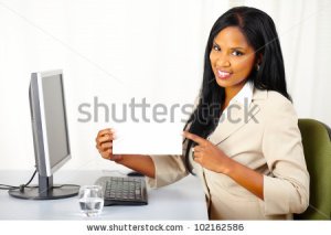 stock-photo-portrait-of-a-friendly-young-executive-lady-at-work-while-show-a-white-card-102162586